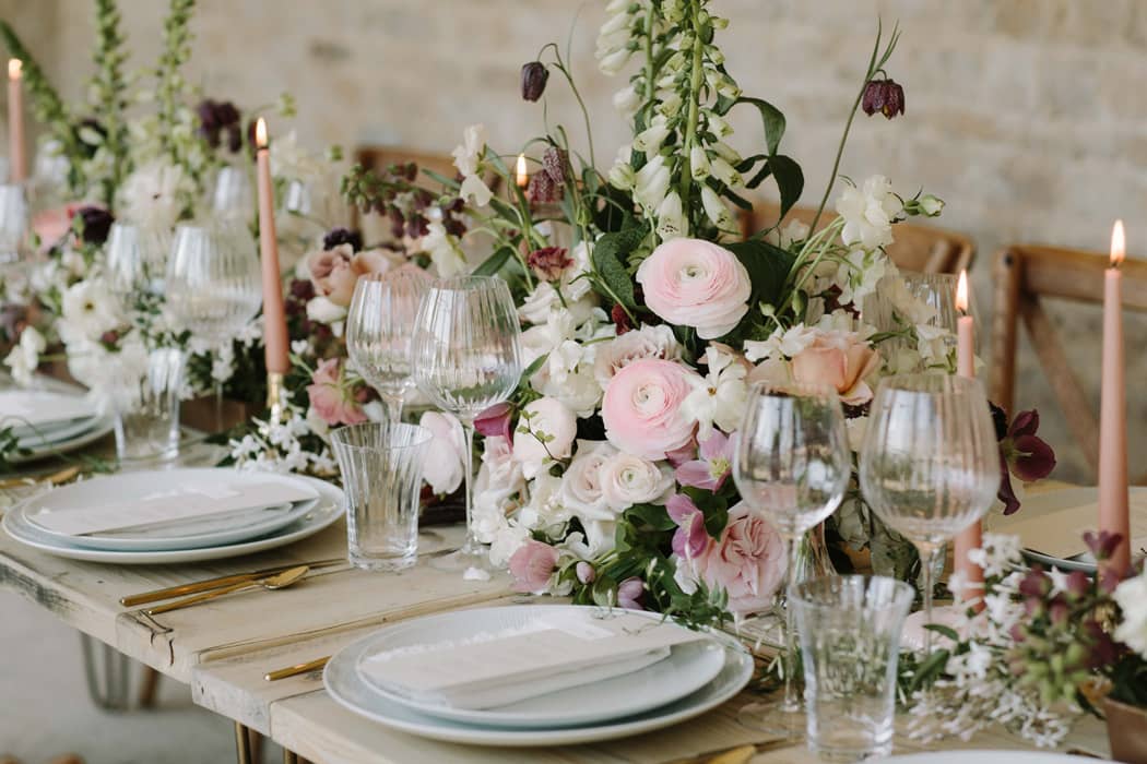 Image by <a class="text-taupe-100" href="http://www.rebeccagoddardphotography.com" target="_blank">Rebecca Goddard Photography</a> | Flowers by <a class="text-taupe-100" href="https://www.mossandstone.co.uk" target="_blank">Moss & Stone Floral Design</a> and <a class="text-taupe-100" href="https://www.blueskyflowers.co.uk" target="_blank">Blue Sky Flowers</a>.
