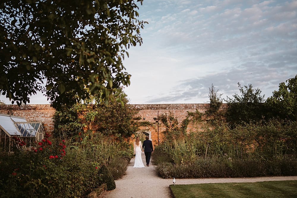 Image by <a class="text-taupe-100" href="https://owenthomasweddings.com" target="_blank">Owen Thomas Photography</a> at The Walled Garden at Cowdray.