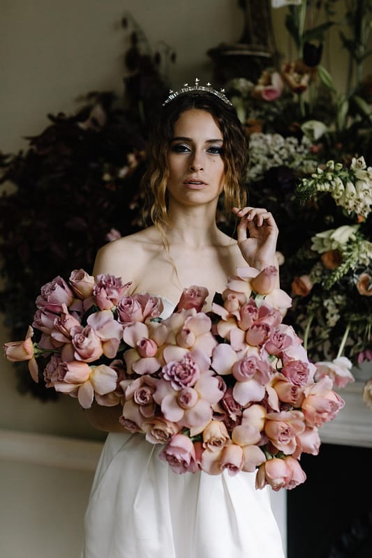 Image by <a class="text-taupe-100" href="http://www.rebeccagoddardphotography.com" target="_blank">Rebecca Goddard Photography</a> | Bouquet by <a class="text-taupe-100" href="http://jayarcherfloraldesign.com" target="_blank">Jay Archer Floral Design</a> | Venue <a class="text-taupe-100" href="http://cocoweddingvenues.co.uk/coco_listing/pynes-house/" target="_blank">Pynes House</a>.