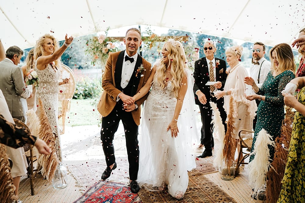 Image by <a class="text-p3" href="https://www.michaelmaurerweddings.com" target="_blank">Michael Maurer</a> at The Secret River Garden.