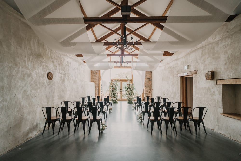 Image by <a class="text-p3" href="https://kamilanowakphotography.com" target="_blank">Kamila Nowak Photography</a> at Upton Barn.