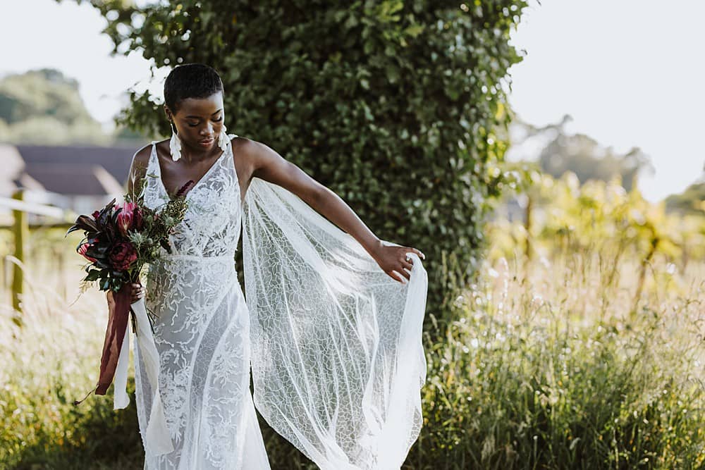 Image by <a class="text-p3" href="https://www.lauramarthaphotography.com" target="_blank">Laura Martha Photography</a> at <a class="text-p3" href="https://cocoweddingvenues.co.uk/coco_listing/three-choirs-vineyards/" target="_blank">Three Choirs Vineyards</a>.