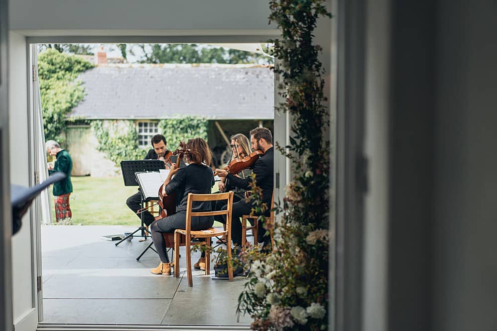 Image by <a class="text-p3" href="http://www.rosstalling.co.uk" target="_blank">Ross Talling Photography</a> at <a class="text-p3" href="https://cocoweddingvenues.co.uk/coco_listing/treseren/" target="_blank">Treseren</a>.