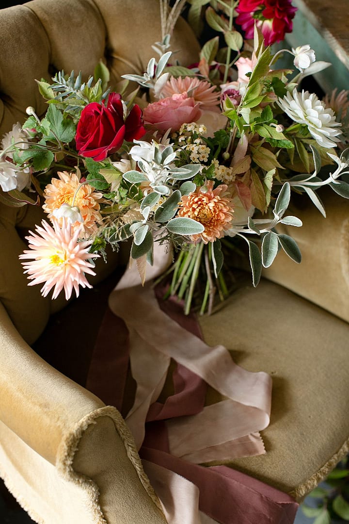 Image by <a class="text-p3" href="http://www.corettefauxphotography.co.uk" target="_blank">Corette Faux Photography</a> | Flowers by <a class="text-p3" href="https://jennibloom.com" target="_blank">Jenni Bloom Floral Design Studio</a>.