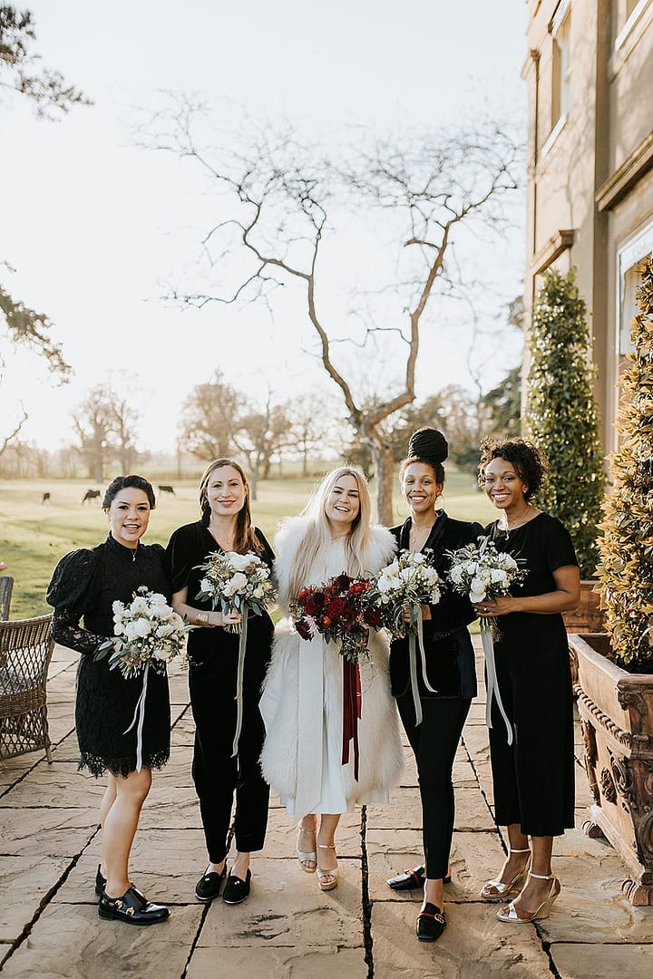Image by <a class="text-p3" href="https://www.damienmilan.com" target="_blank">Damien Milan Photography</a> | Flowers by <a class="text-p3" href="https://www.mossandstone.co.uk" target="_blank">Moss & Stone Floral Design</a>.