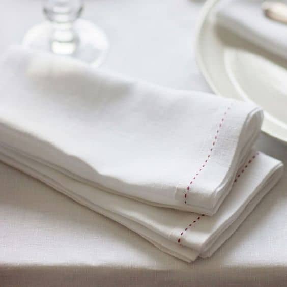 The Linen Works Raspberry Stitched White Set of 4 Napkins - £50.00