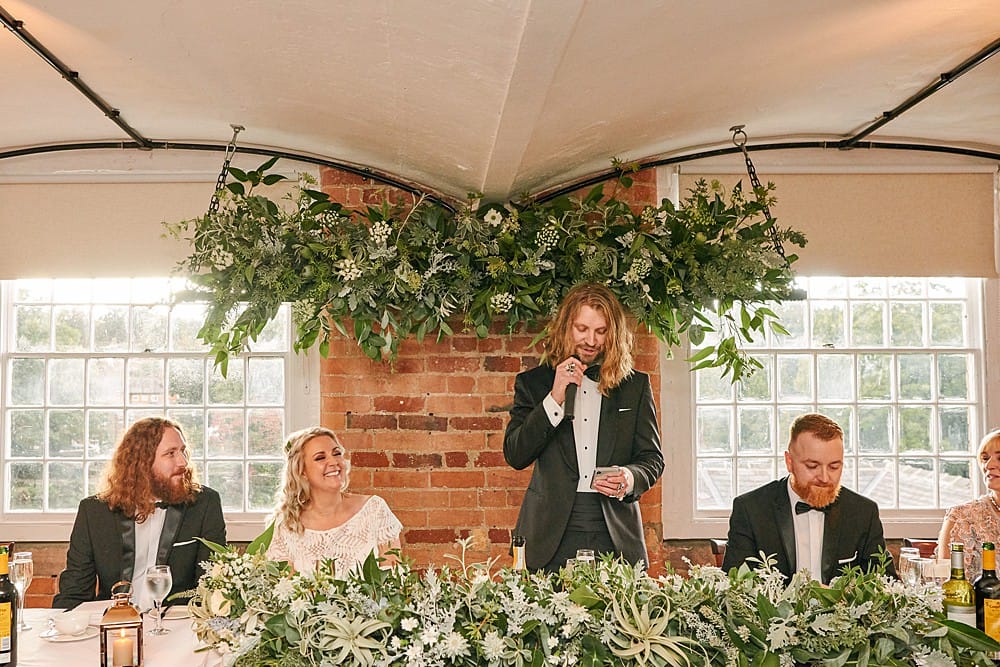 Image by <a class="text-p3" href="https://weddingsbysallyrose.com" target="_blank">Weddings by Sally Rose</a>.