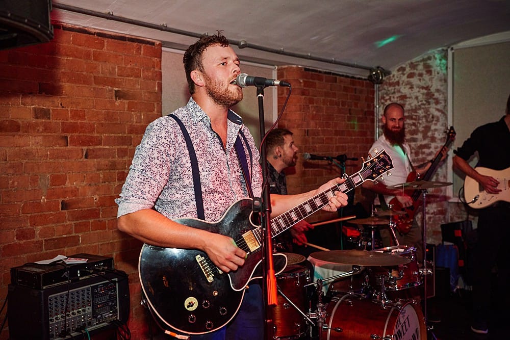 Image by <a class="text-p3" href="https://weddingsbysallyrose.com" target="_blank">Weddings by Sally Rose</a>.