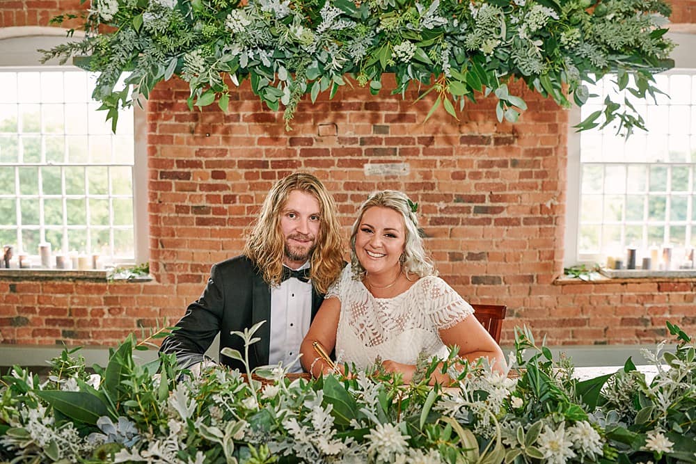 Image by <a class="text-p3" href="https://weddingsbysallyrose.com" target="_blank">Weddings by Sally Rose</a>.