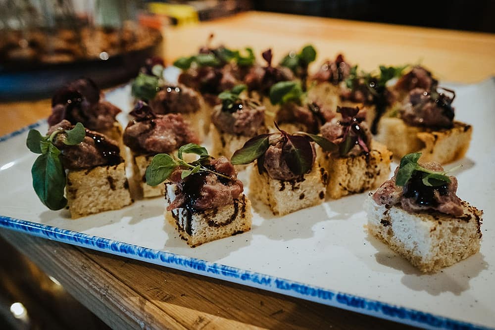 Image by <a class="text-p3" href="https://www.alexapoppeweddingphotography.com" target="_blank">Alexa Poppe Photography</a>.