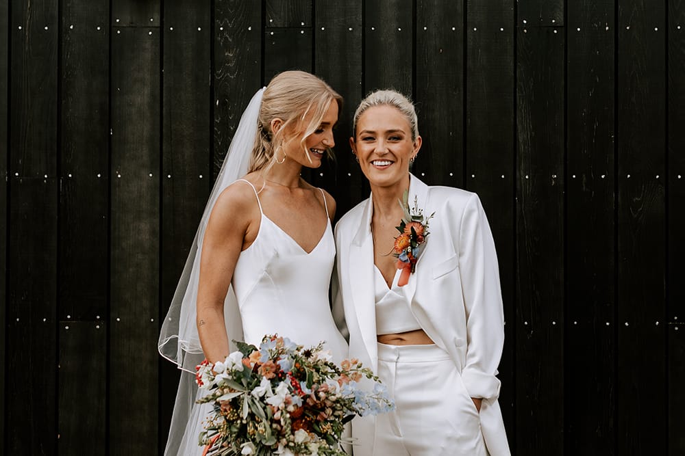 Sophie & Katie | Image by <a class="text-taupe-100" href="https://www.emmakennyweddings.com" target="_blank">Emma Kenny Photography</a>.