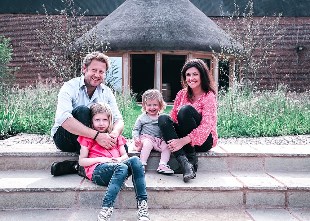 Joanna, Matt and their two young daughters, Emilia and Ellie | Image by <a class="text-taupe-100" href="https://www.instagram.com/liseleinophotography/?hl=en-gb" target="_blank">Lise Leino Photography</a>.