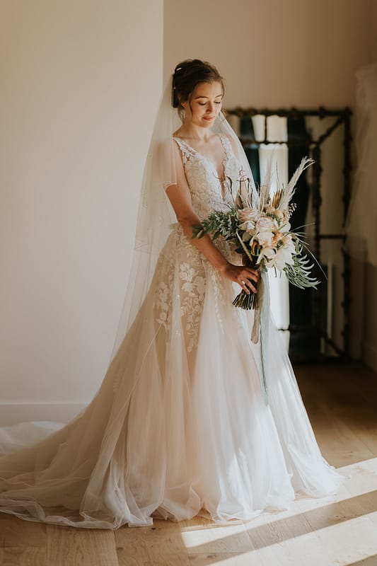 Images by <a class="text-taupe-100" href="https://www.laurashaw.co.uk" target="_blank">Laura Shaw Photography</a> and <a class="text-taupe-100" href="https://drewbucklerweddings.com/" target="_blank">Drew Buckler Weddings</a>.